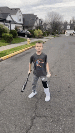 Boy and a baseball bat