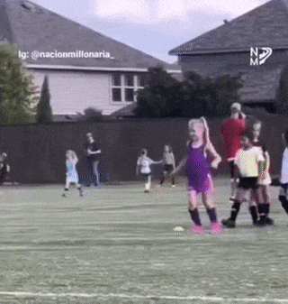 Little girl footballer or cheerleader