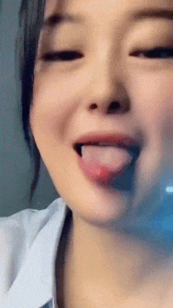 Girl weaves her tongue
