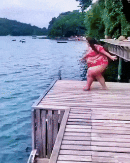 Girl jumps into water