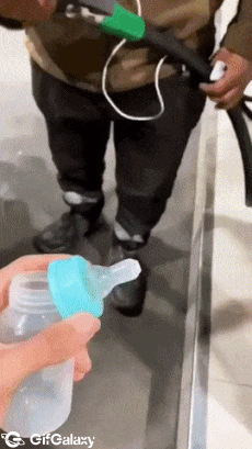 Pouring fuel into baby bottle