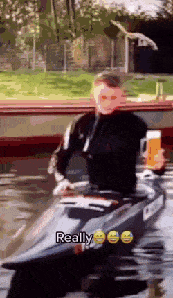 Guy in boat and beer