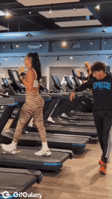 Guy in gym falls on treadmill
