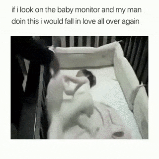 Father puts baby to sleep