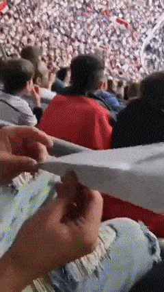 Paper plane on stadium