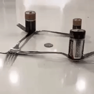 Trick with battery coin and forks