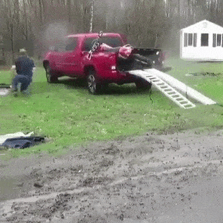 Loading motorcycle into truck