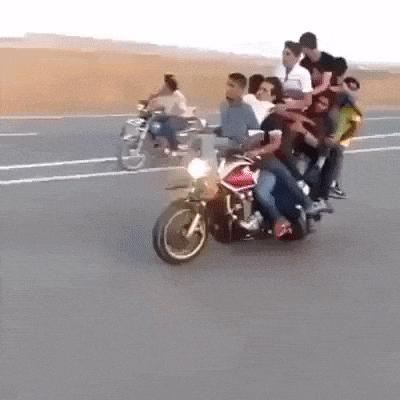 Lots of people on motorcycle