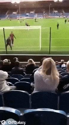 Woman at football match