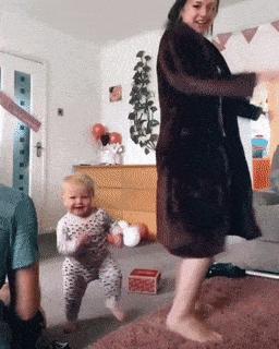 Baby And Dancing With Camera