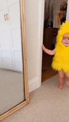 Child in yellow duck costume
