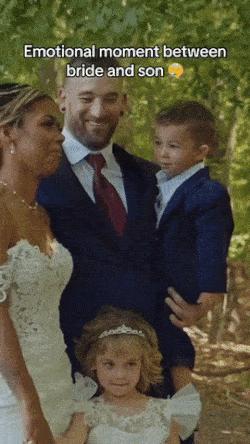 Boy and mother at wedding