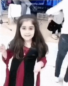 Little girl is pulling her hair