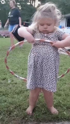 Little girl and hula hoop