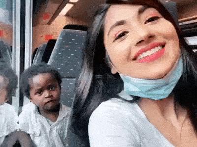 Girl and child on bus