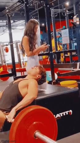 Girl and guy in gym