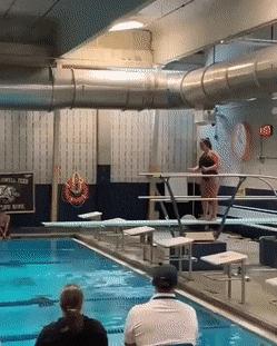 Girl and perfect jump in pool