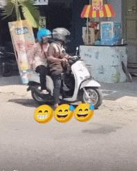 Girl on motorcycle and boyfriend