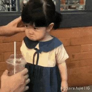 Angry little girl and juice