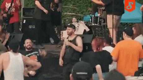 Metal concert and man with beer