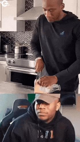 Guy cuts bread with board