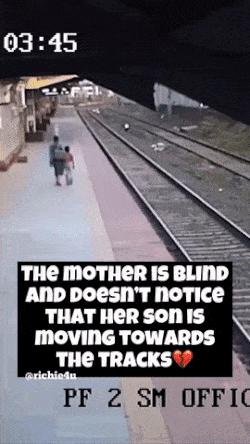 Guy saves boy from train