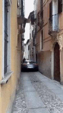 New car in narrow street