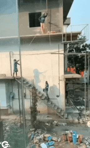 Workers lift load