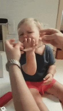 Child reaction after putting on glasses
