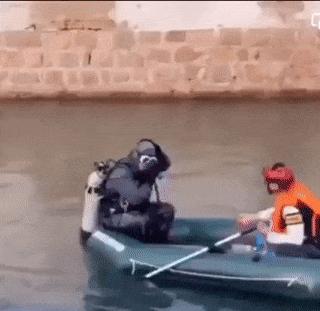 Diver in shallow water