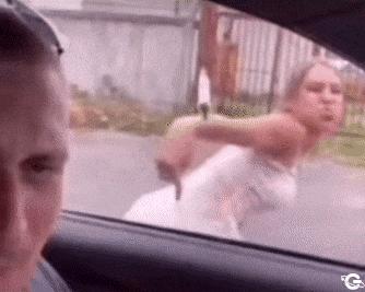 Mocking girl at car window