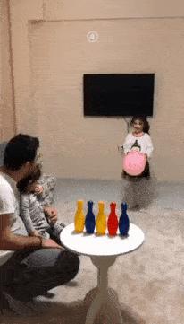 Great father playing with his daughters
