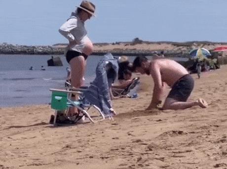 Pregnant woman on beach